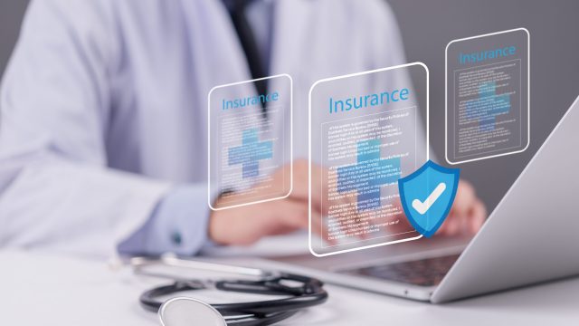 Health,Insurance,Concept,With,Digital,Document,Interface,And,Shield,Icon,